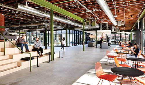 An indoor/outdoor workspace at Procore Technologies, a construction software management company, is both uplifting and welcoming.
