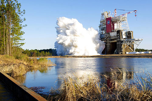 At Stennis Space Center in Hancock County, Mississippi, NASA conducts a hot fire test of the core stage for its Space Launch System rocket. Photo credit: NASA website
