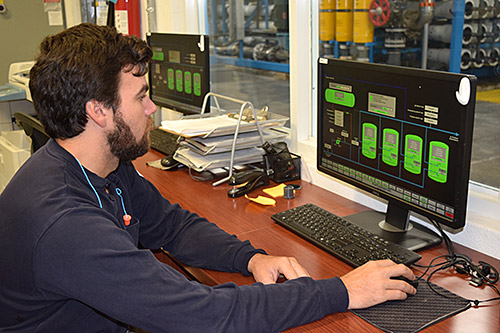 A Seven Seas Water employee works on delivering total water management solutions from a power plant on St. Croix, U.S. Virgin Islands.