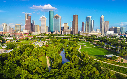 Downtown skyline surrounded by one of Houston’s signature greenspaces, Buffalo Bayou Park